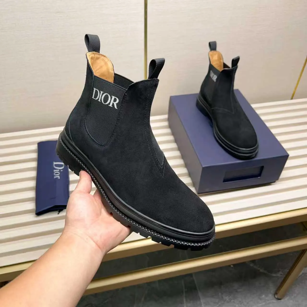 Men's Shoes 💰480 Dior A practical choice that combines protection with classic style. Made from durable Rugged Calf leather, it's tumbled and hand-finished to create a soft suede feel with a rich texture. Elastic side panels and subtle cutouts are inspired by the classic Chelsea boot. Leather upper and lining with Kummel tabs at front and rear, rubber outsole